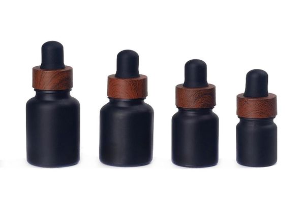 Flaconi contagocce in vetro nero smerigliato Flacone per profumi di olio essenziale con tappo in plastica con venature del legno da 5 ml a 100 ml2012932