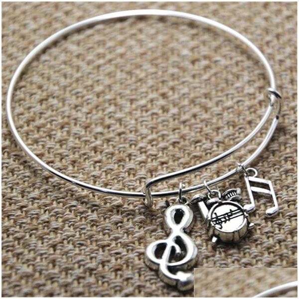 Braccialetti rigidi 12 pezzi Braccialetti musicali per batteria Chiave di violino e braccialetti con ciondoli per note musicali Gioielli con consegna di goccia Dhha8