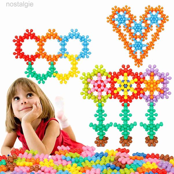 Blocchi 290 pezzi di fiori di pruno blocchi di costruzione 3D rotanti fette di fiocco di neve 3D splicing giocattoli fai da te in plastica per puzzle educazione precoce 240401