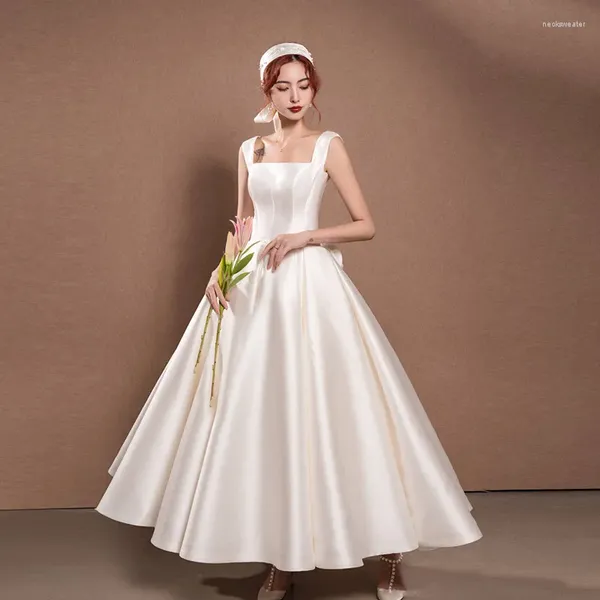 Ethnische Kleidung Französischer Stil Braut Satin Brautkleid Qipao Sexy Hosenträger Rückenfrei Große Schleife Promi Bankett Elegant Weiß Plissee