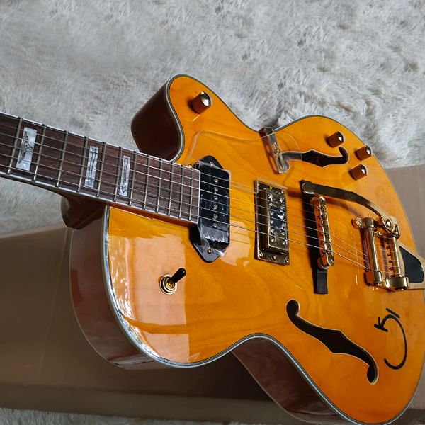 GİTAR Bu, benzersiz ve güzel tıngısı ve güzel görünüme sahip klasik bir yarı içi boş elektro gitar. Eve postalanır