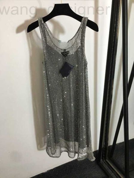 Vestidos casuais básicos designer 2023 primavera / verão nova estrela mesmo estilo cheio de unhas brilhantes malha de diamante oco vestido superior com alça pendurada forro EUHL