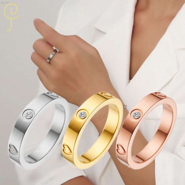 Vendita all'ingrosso moda donna ragazza regalo gioielli in acciaio inossidabile 18 carati zircone intarsio diamante amore vite pesca a forma di cuore anelli di coppia