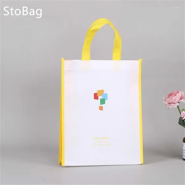 Confezione regalo StoBag Stampa a colori Borsa in tessuto non tessuto vuota Imballaggio impermeabile Vestiti Caramelle Giocattolo Libro Scarpe per forniture scolastiche Decorazioni per feste per bambini