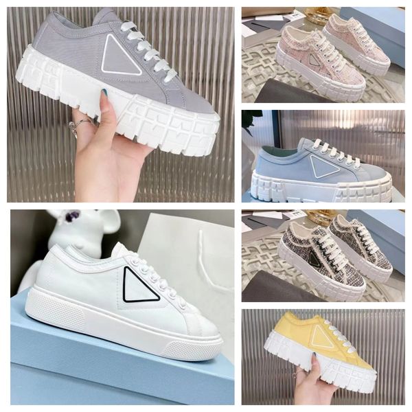 2024 Novos sapatos de designer de primeira linha tênis de nylon preto azul casual tênis de rodas de marca de rodas canvas feminino sneake Moda plata