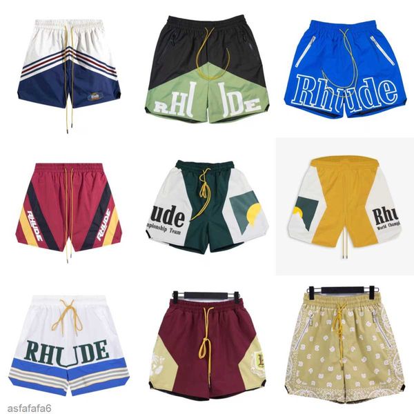Rhude Shorts Mens Fashion Beach Pants Sports Fitness Luxury High Summer Summer Casual Versátil Secagem rápida Mesh respirável BV3F
