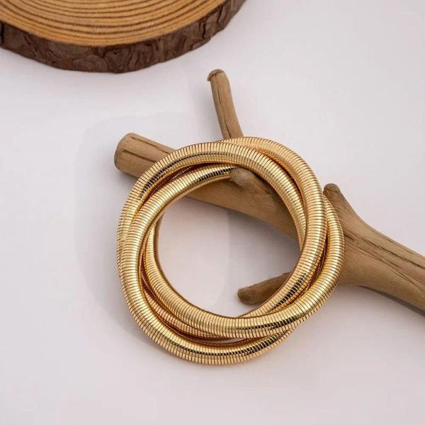 Braccialetti eleganti braccialetti a spirale elastica irregolare esagerata in lega di zinco in lega di zinco europea cuffia in stile americano
