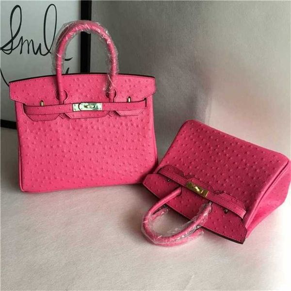 Bolsas desigenr bolsas de avestruz couro 5a genuíno de mão -de -handswen vaca vaca portátil oneshoulder diagonal rosa rosa rosa temperamentAjkc