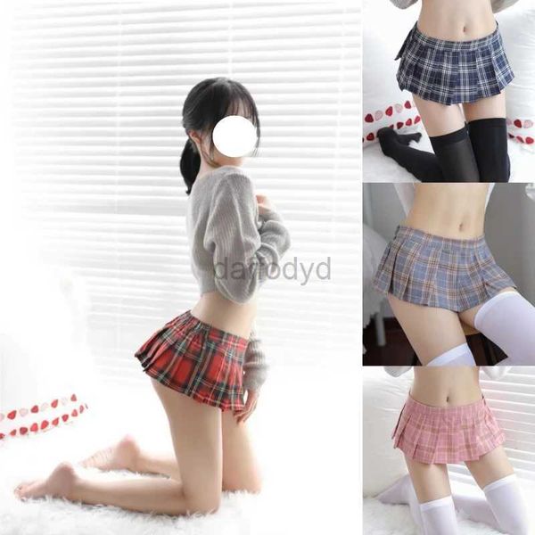 Urban sexy Kleider UltraShort JK Röcke Plaid Cosplay Rock Sexy Minirock Porno Sommerschüler Faltenschwarzer Röcke Japanischer Stil Frauen Clubwear 240403