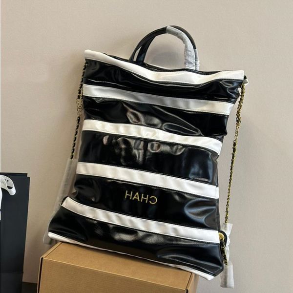 Ladie moda 22bag mochila estilo designer sacola bolsa grande capacidade portátil saco da câmera saco de lixo saco de corrente de metal laca leathe