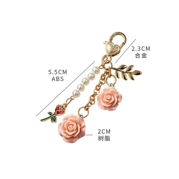 Sweet 3D Rose Camellia Schlüsselbund mehrfarbiger Blütenschlüsselring mit Perlenquasten Metallblatt Frauen Earphone Hülle Handtasche Zubehör