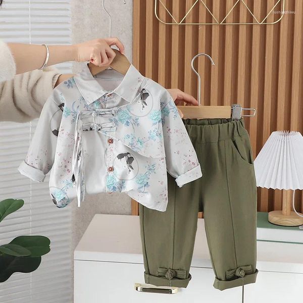 L'abbigliamento stabilisce la tendenza della tuta da ragazzo a due pezzi per i bambini in cinese primavera e autunno.