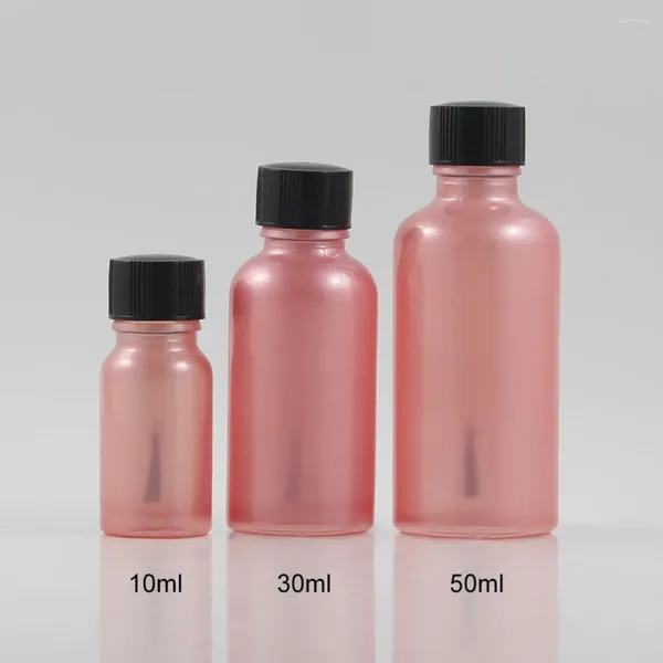 Bottiglie di stoccaggio Fornitori di porcellana da 100 pezzi da 30 ml di olio arrotondate per olio per unghie rotondo bottiglia polacca con un pennello per coperchio