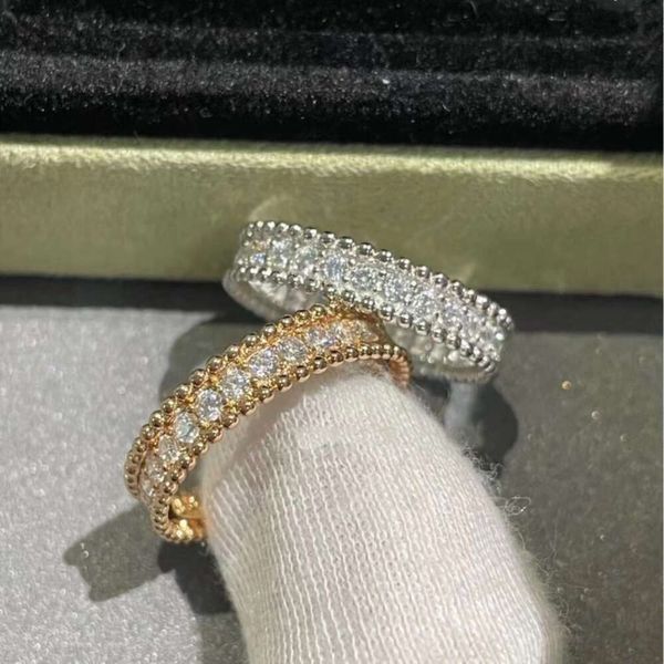 Edição estreita Lucky Four Clover Flower Tube com borda de diamante completa, espessura em V-Gold feminina 18k, europeu e americano requintado anel de estrela cintilante