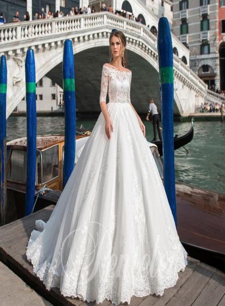 Abiti da sposa in pizzo in pizzo vintage 2019 scollatura bateau a mezze maniche illusione corrido di tulle appliques abiti da sposa con coperto5102992