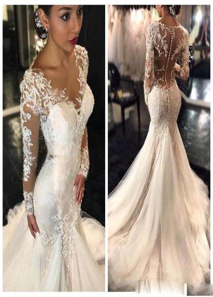 2017 Nuovi abiti da sposa sirena sexy a pizzo sexy Dubai Arabo Arabo Patoia a maniche lunghe naturali abiti da sposa a coda di pesce naturale Custo5154645