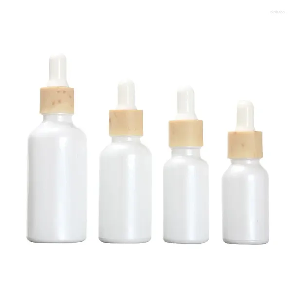 Lagerflaschen 15pcs Glas ätherische Ölfläschchen 15ml 20ml 30 ml 50 ml falsche Holzring nachfüllbarer Flasche leeres Porzellan weißer kosmetischer Tropfen