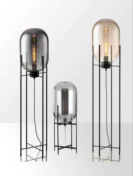 ODA Pulpo Nordic postmoderner Industrie Windglas Stehlampe Wohnzimmer Einfache Stehlampe Eisenhalterung stehende Lampe Bernsteinkugel A9001321