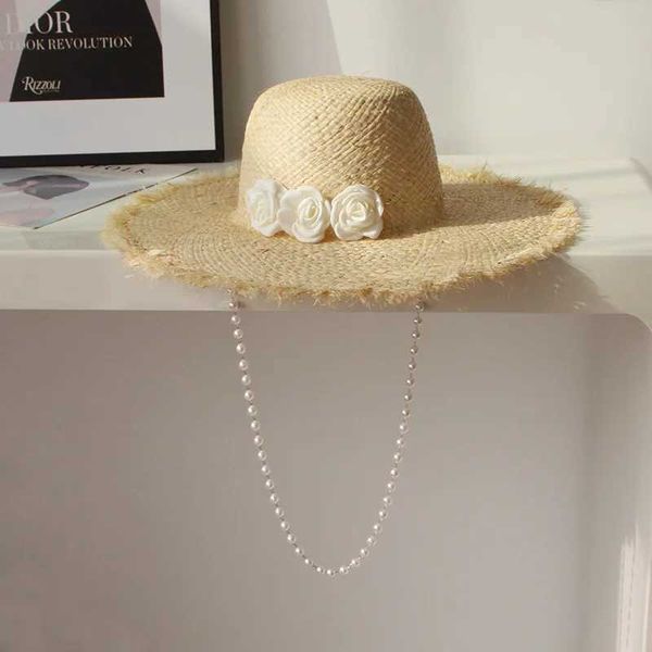 Breite Krempe Hüte Eimer Hüte High -End -Breite Raffia Sonne Hut Frauen Sommer Sonnenschutzhut Blume Perle Kette Fedora Hut Strand Party Frauen Strohhut Q240403