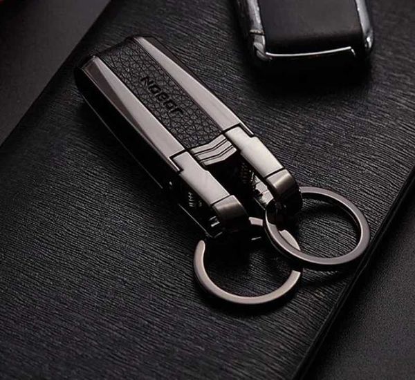 Клайки Lanyards Новые высококачественные металлические ключи мужчины Top Car Ring Business Charm Кожаная сумка держатель Best Gift Jewelry K3149 Q240403