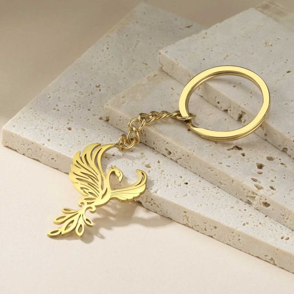 Chaços de chaveiros lemegeton phoenix keychain pingente de aço inoxidável jóias de pássaros charmosos acessórios fofos key Gold Wholesale q240403