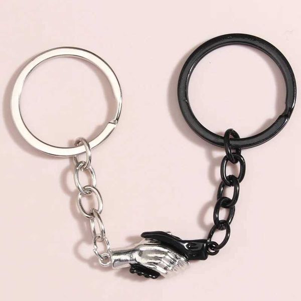 Keychains Capitóis Novo Esmalchain Double Color Handshake Tecla anel de botão magnético Cadeias Presentes de amizade para mulheres homens Jóias feitas à mão q240403