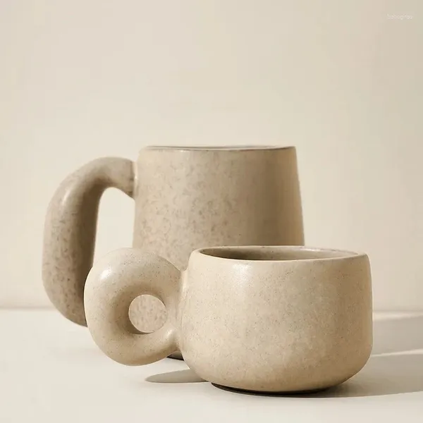 Tazze di piattini tazze da caffè in ceramica europea Acqua originale Big tè tazze divertenti espresso grande design per manico per cereali creativi per la colazione