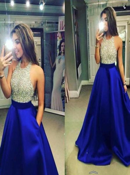 Neue Royal Blue Satin Prom Kleider Halfter Perlen Top Eine Linie bodenlange Partykleider Abendkleider Juwelen Pailletten Rückenless Homecom2285228