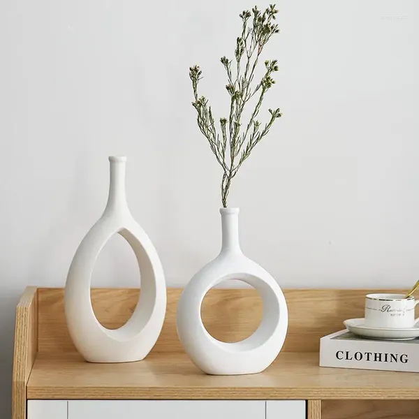 Vasi Ceramica creativa Vaso moderno Minimalista scavato Ornamenti soggiorno decorazioni per la casa Fiori secchi Fiori