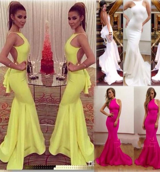 2019 Amazing Sexy Crew Neck Yellow Mermaid Abito da sera Michael Costello Sexy Wexless Formale Ruffles Gowns Stretch MA3594593