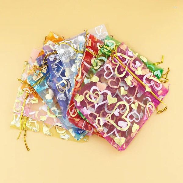 Geschenkverpackung 100pcs/Los Bronzing Herzmuster Organza -Taschen Schmuck Verpackung Drawess Garn Netto Hochzeitsfeier Gefälligkeiten Beutel