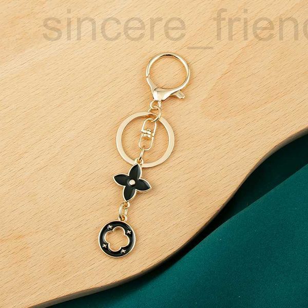 Keychains colhedores designers designer Keychain Twiggy Chain Gold Letters Fashion feminino Bag charme Ligante de keyring liga clássica Rings Portachiavi SG11