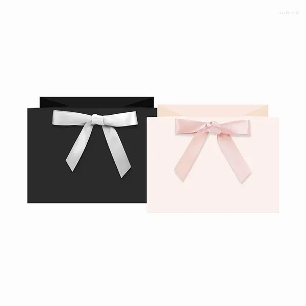 Wrap regalo 500pcs/abbigliamento da logo personalizzato Borse da imballo di carta riutilizzabile con bowknot con bowknot