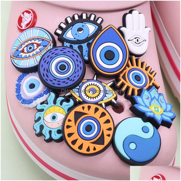 Jóias por atacado 100pcs PVC Blue Eyes Homem Mulher Mulher Cool Jardim Sapato Decorações de fivela para Yin e Yang Botão Backpack Dhusw