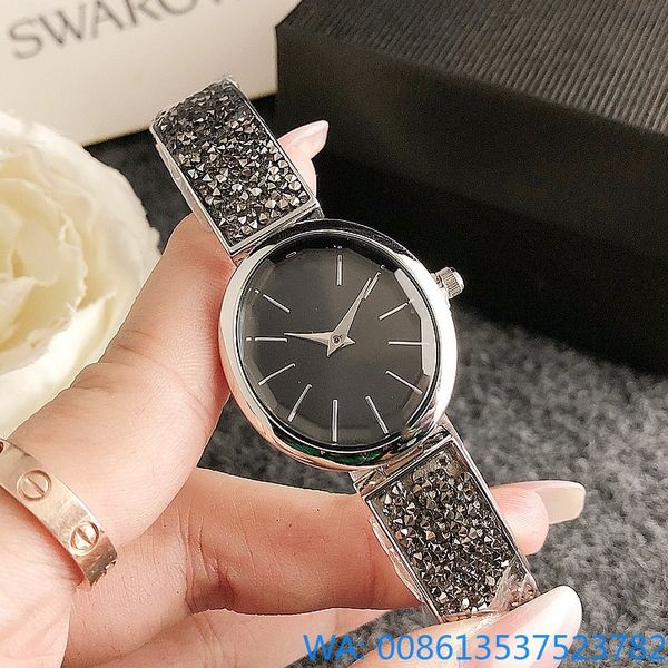 2024 SW Fashion Style Brand Brand Quartz Watches Watch для женщин с хрустальным циферблатом металлическая стальная группа оптовые роскошные часы бесплатная доставка