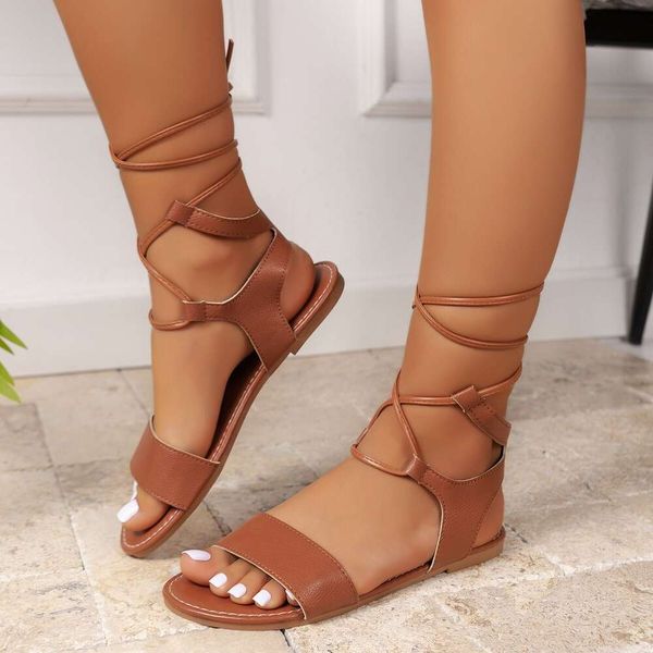 Sommer neue flache Sandalen Damen Füße Band Mode komfortabler Strand