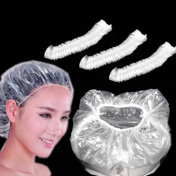 Capas de chuveiro descartáveis de 100 pcs plástico tampa de cabelo transparente à prova d'água para homens viagens para casa de banho de chá de banho para casa de lavagem de cabelos suprimentos