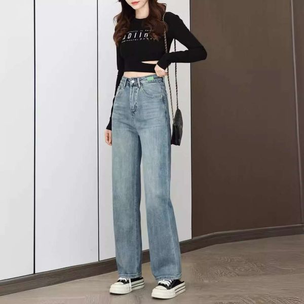 Стильный стильный тон, спроектированный с высокой талией и тонкими контрастными цветными карманами безграничные джинсы с широкими ногами
