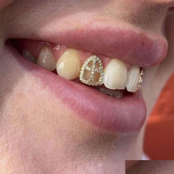 Grillz Dentalgrill Rachelz Hip Hop Hohlhöhle Zirkon Kreuzzähne Grillz 14K Gold plattiert CZ Steinzahnkappen Dekor für Frauen Juwel Dhwbn