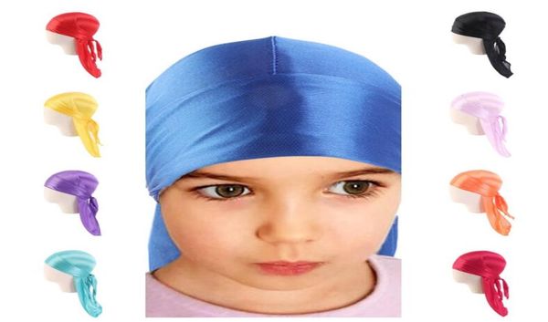 Baby Kids Caps Silky Durag Boy Girls Langschwanz Dorag Durags Satin Turban Headwraps Kinder Seidenstirnband Piratenhut Headscarf E112854730