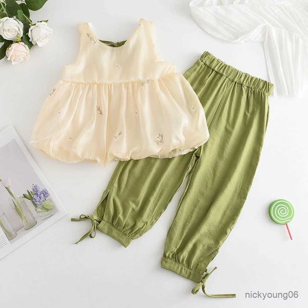 Set di abbigliamento set di ragazze per bambini Set di abbigliamento Summer Hollow Stilling Green Tops +Pants Outfit Girls Girls Vesti