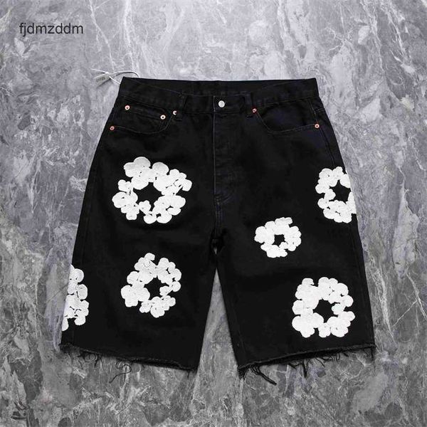 Designer masculino shorts casuais American High Street Trendy Brand Loose Kapok desgastado e bordado branco jeans para ambos os homens