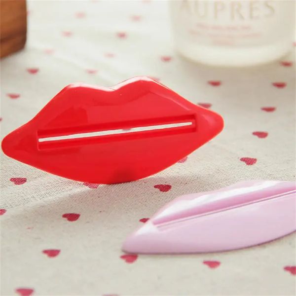 Pasta de dente espremedor de espremolador vermelho romance de forma multiuso material preferido em duas cores das necessidades diárias opcionais Extrusora em massa