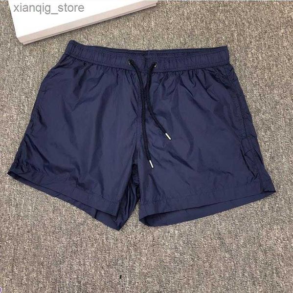 Shorts maschile Summer Men Nylon Swim Shorts Designer Gentleman Side Tasches Swim Crush Closure Closure Back Tasco Tonal DrawCord Short Pants L49