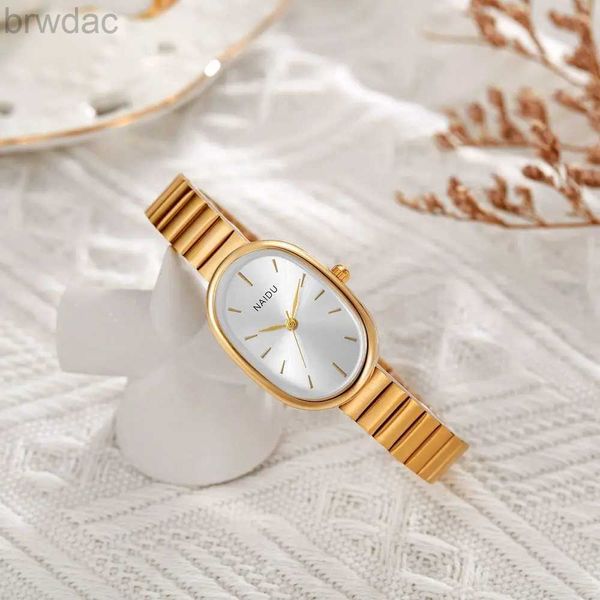 Frauen Uhren Frauen Quarz Uhr Luxus oval geformtes Mode Mini Hülle kleine römische Zifferblatt weibliche Full Metal Band Uhren Nische Armbandwatch 240409