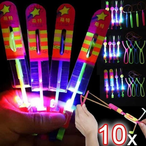 Giocattoli volanti a LED 10/1 pezzi per bambini giocattoli razzo freccia luminosa flash illuminazione a led up elastico giochi catapulti Giochi di volo veloce elastico esterno 240410