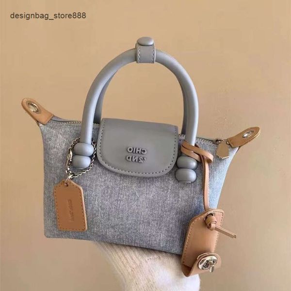 Designer di borse venditori caldi nanfeng new platinum blue tote bag alla moda e portatile una spalla incrociata