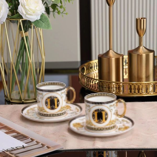 Дизайнерские чашки и блюдцы устанавливают роскошную чайную чашку Классическую домашнюю кость в Китай кофейная чашка F-J