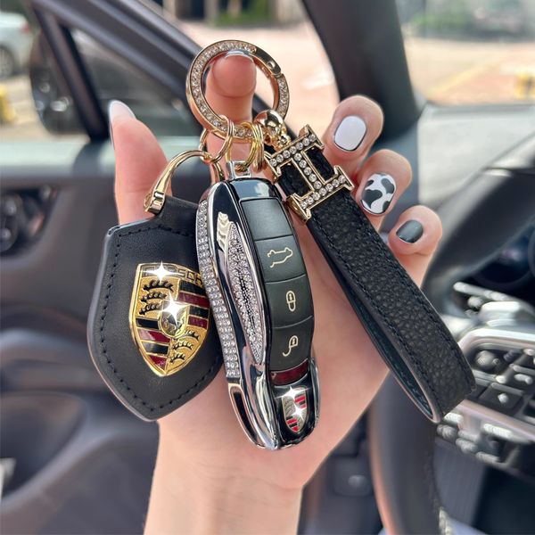 Luxury Bling Design Auto Car Logo Key FOB Shell Hülle Key Bag Schlüsselschutz -Schlüsselhalter mit Lederschlüsselkettenschlüsselung für Porsche Macan Cayenne Panamera Cayman usw.