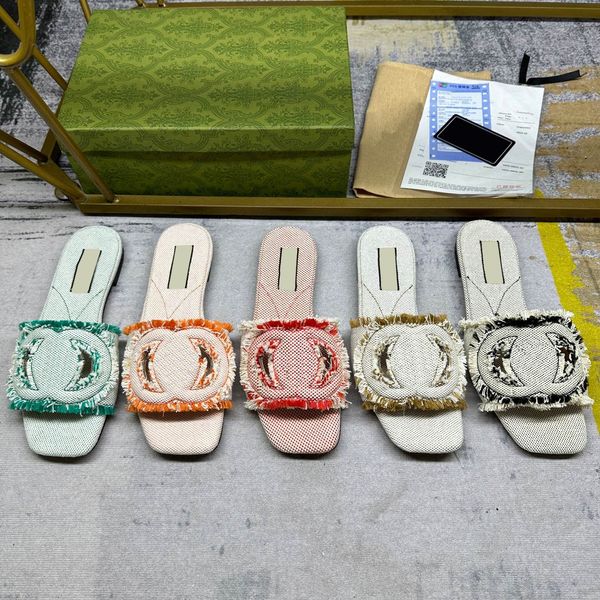 Designer Mulheres interligadas Slide Tassels de sandália chinelo recortado tecido designer de couro plano sola sola praia de praia de chinelos de moda de moda de moda designer
